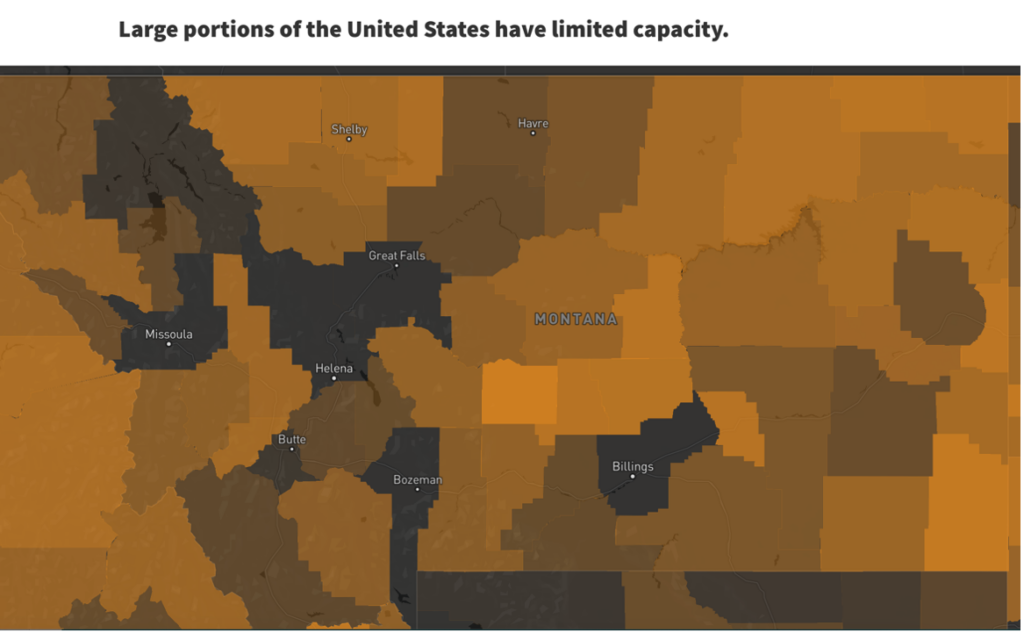 A map of Montana counties in gradations of orange. Color shade is determined by capacity rating of each county. Urban and western counties are generally darker, showing more capacity, while counties in eastern Montana are more orange to represent less capacity.